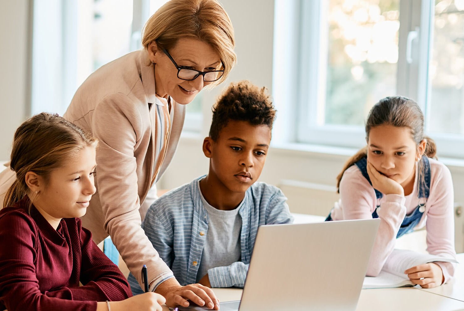 Woman and kids with laptop