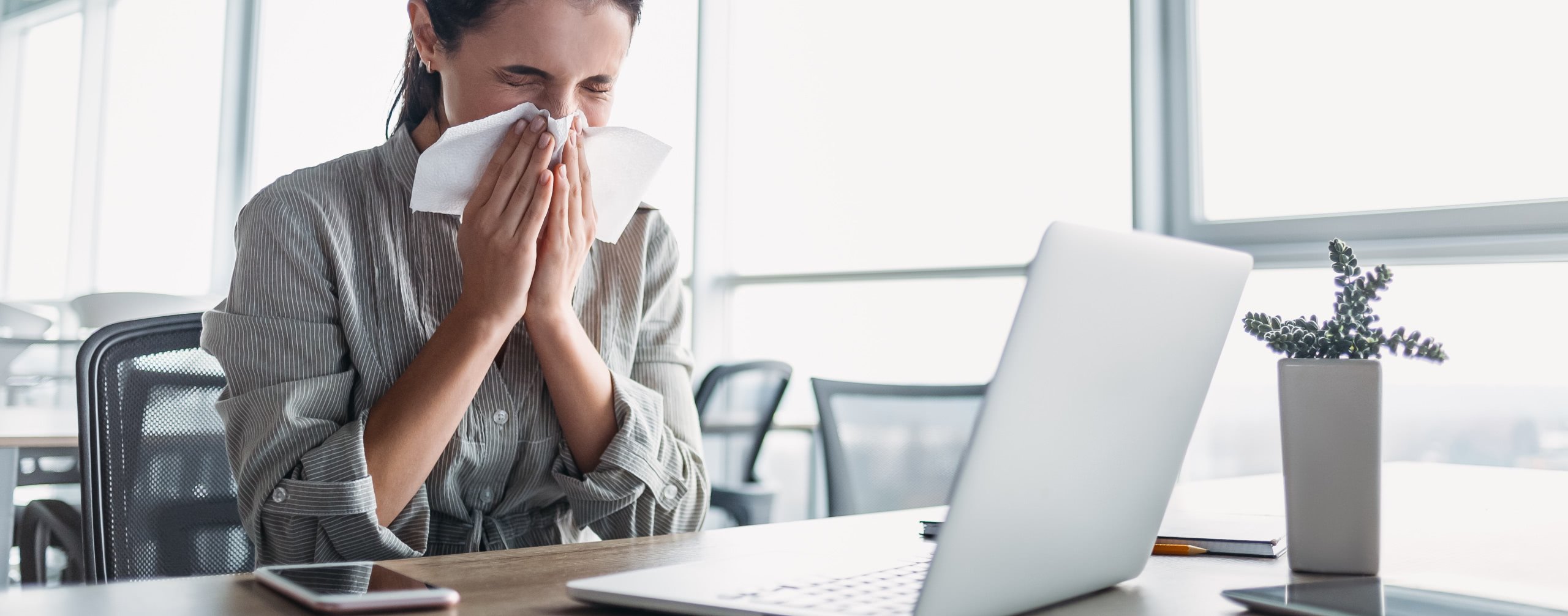 sick woman at computer