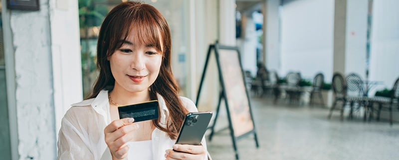 woman using text banking